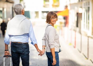 Couple enjoying their retirement holiday because they have finacial plans in place
