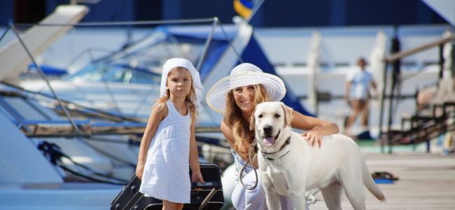 Mother, young daughter and pet dog on the move with mortgage services from Aetas Partners
