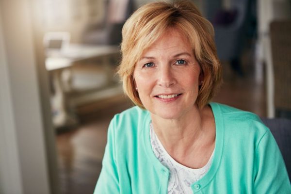 susan-story-financial-planning-aetas-partners middle-aged woman relaxing at home