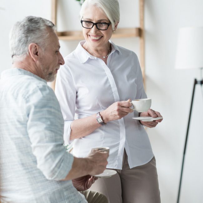Smart senior couple making sound decisions about managing their wealth with Aetas Partners Smart senior couple making sound decisions about managing their wealth with Aetas Partners