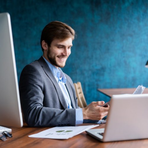Business man working at office with laptop and documents on his desk, consultant lawyer concept. Business man working at office with laptop and documents on his desk, consultant lawyer concept