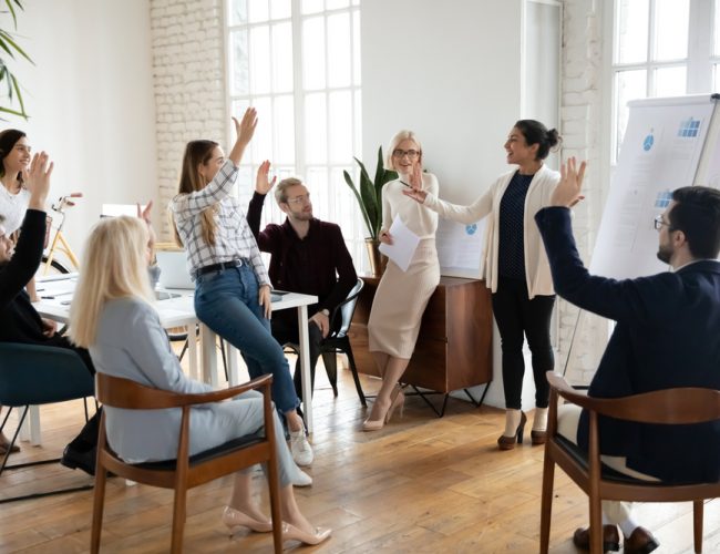 Motivated,Employees,Raising,Hands,,Asking,Coach,At,Training.,Presenter,Finishing Employee Benefits