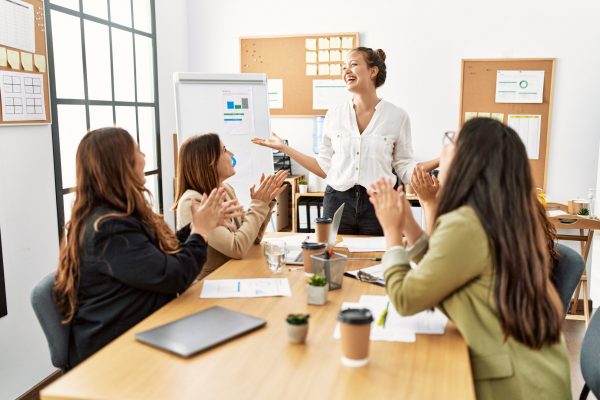 Group,Of,Young,Businesswomen,Smiling,And,Clapping,To,Partner,At Employee Benefits
