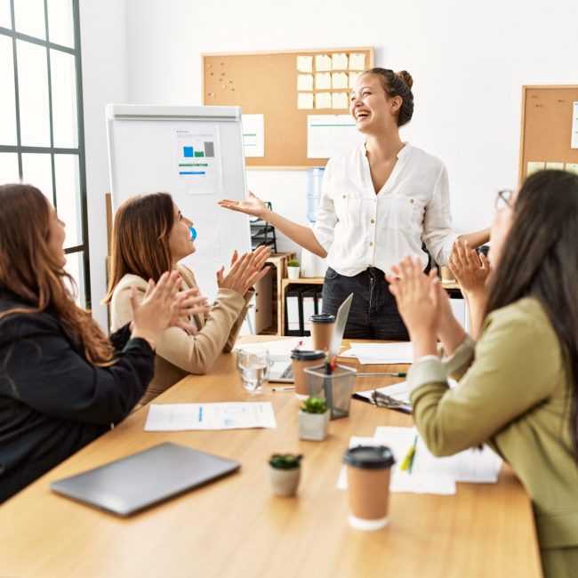 Group,Of,Young,Businesswomen,Smiling,And,Clapping,To,Partner,At Employee Benefits