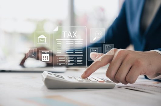 Corporate,And,Individual,Tax,Payment,Concept,,Businessman,Using,Computer,Filling